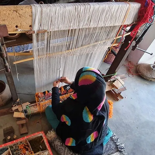 A woman weaver from Djbel Siroua